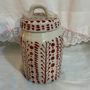 Handcrafted Ceramic Jar with Red Botanical Pattern